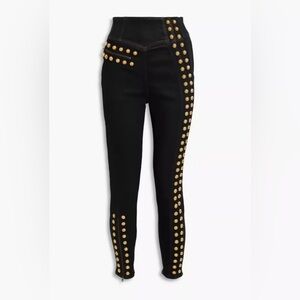 GUCCI
Button-embellished high-rise skinny jeans size 26